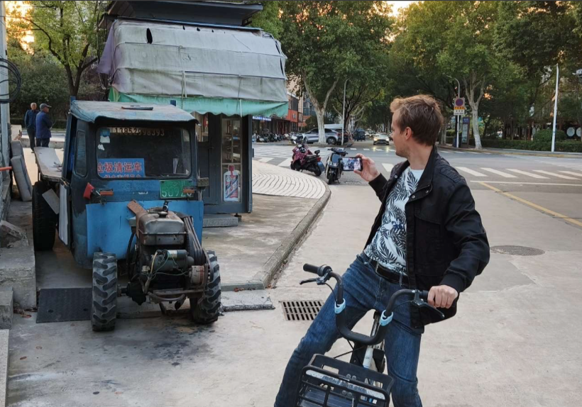 Felix Magnusson appreciating the local motor vehicles
